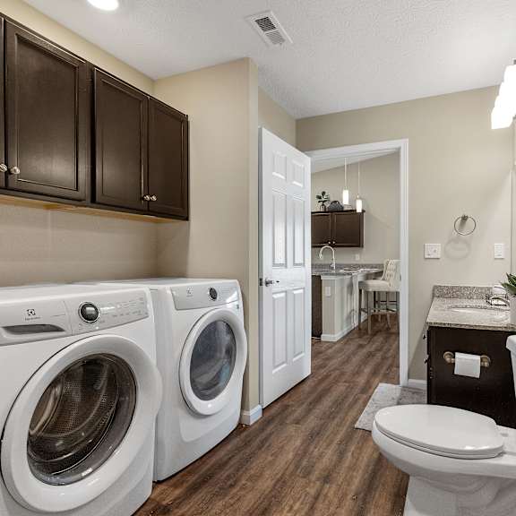 a laundry room with a washer and dryer.