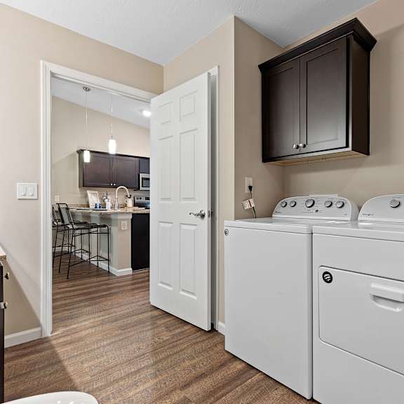 a laundry room with a washer and dryer.