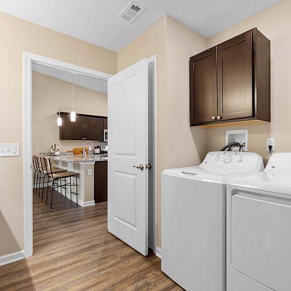 a laundry room with a washer and dryer.