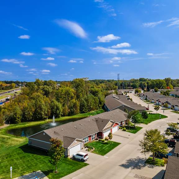 a residential area with houses and a clear sky.