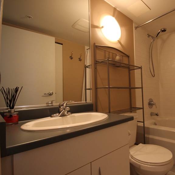 a bathroom with a toilet sink and bathtub