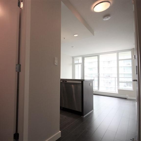 a view of the kitchen from the living room