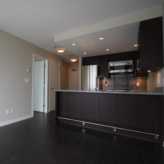a view of the kitchen from the living room