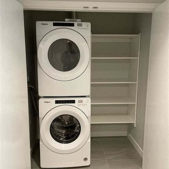 a washing machine and a dryer in a closet