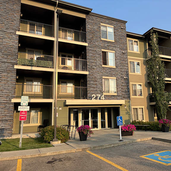apartment building 274 with a parking space in front.