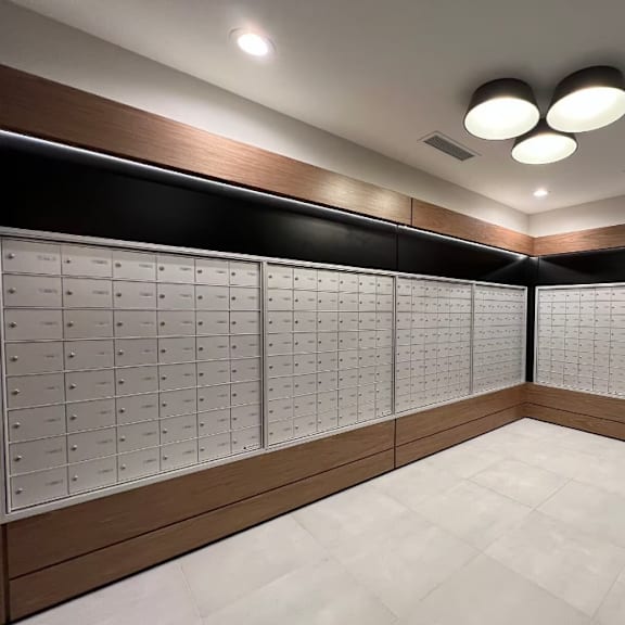 a locker room in a gym with lockers on the wall