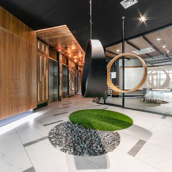 a modern interior with a green circle on the floor.