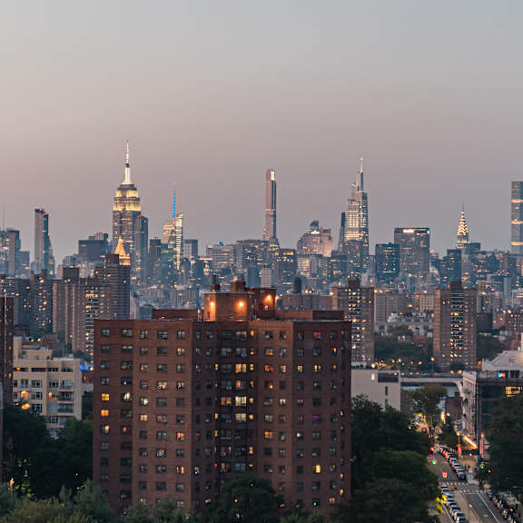 a view of the nyc skyline at night