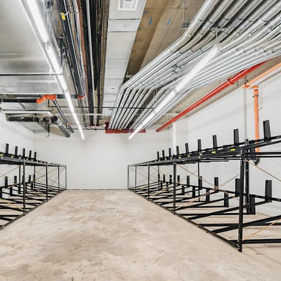 a room filled with scaffolding in a warehouse