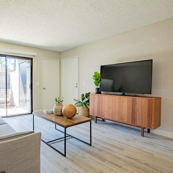 living room with a couch and coffee table at banbury apartments riverside