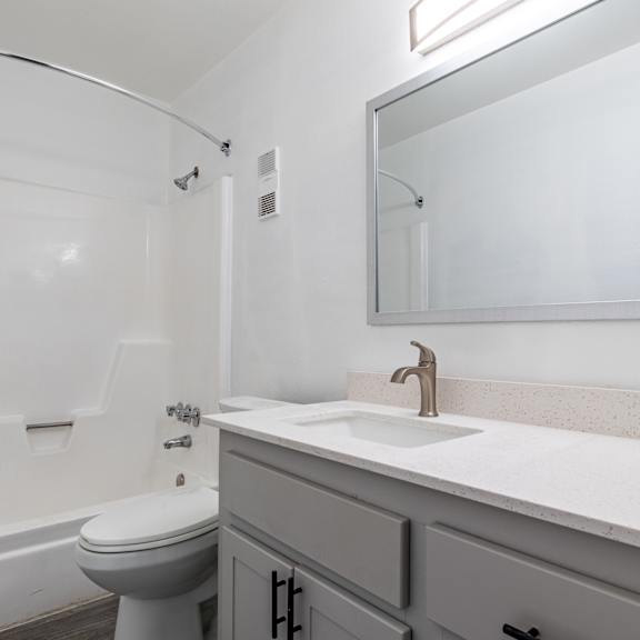 a bathroom with a sink and a toilet  at sofia apartments, tempe, az, 85283