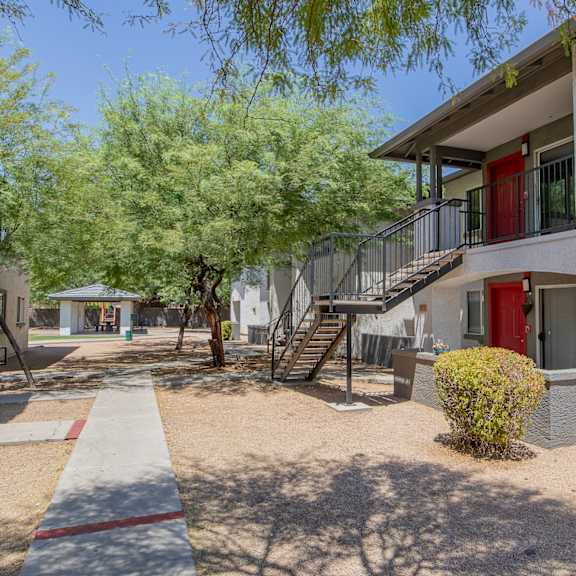 our apartments offer a courtyard with trees and a gazebo