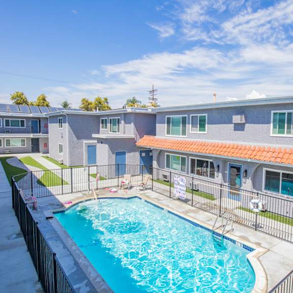our apartments have a large pool and a building with a roof