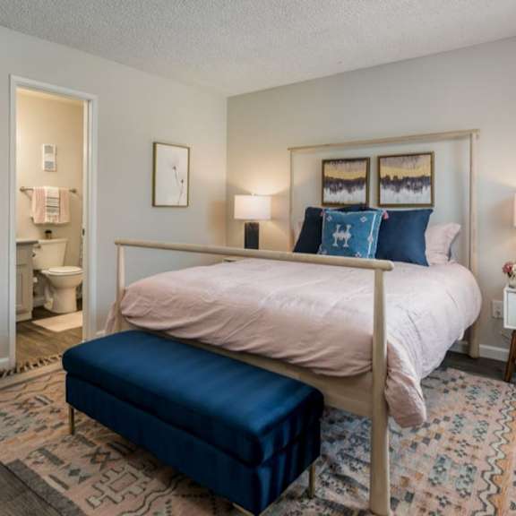 bedroom with cozy bed at sofia apartments, tempe, az
