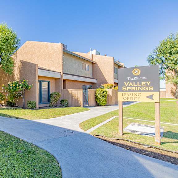 the preserve at valley spring apartments sign in front of building