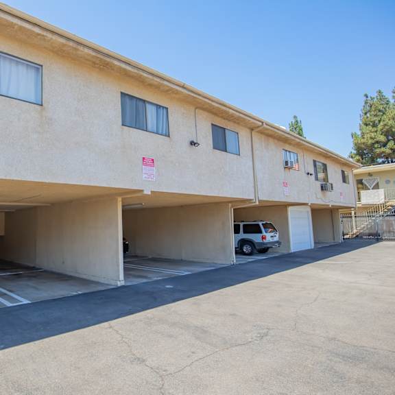 a parking garage with a car parked in it