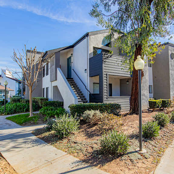 the preserve at ballantyne commons apartments exterior with stairs and trees