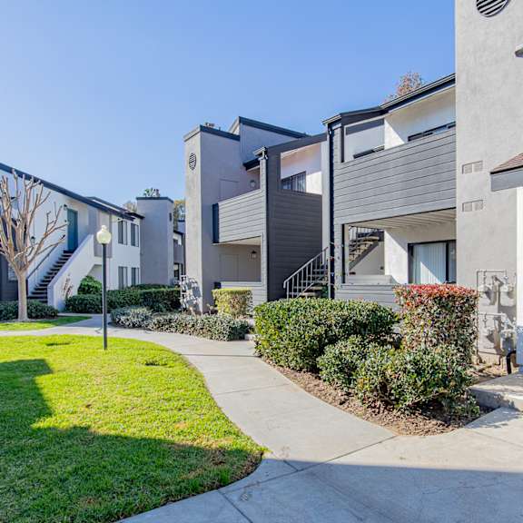 the preserve at ballantyne commons apartments exterior with sidewalk and grass