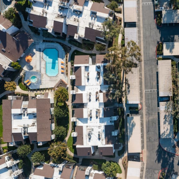 arial view of a house with a tennis court