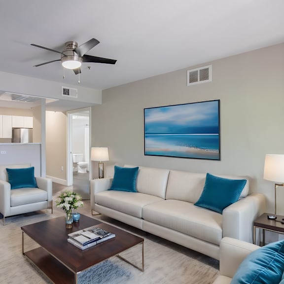 a living room with couches and a coffee table