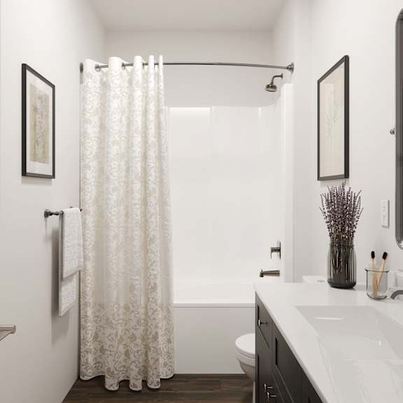 a bathroom with a shower and a sink and a mirror