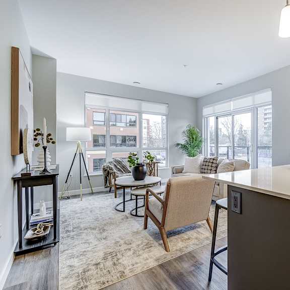 open living room with a kitchen and a dining room at 101 base line road west, london, ontario