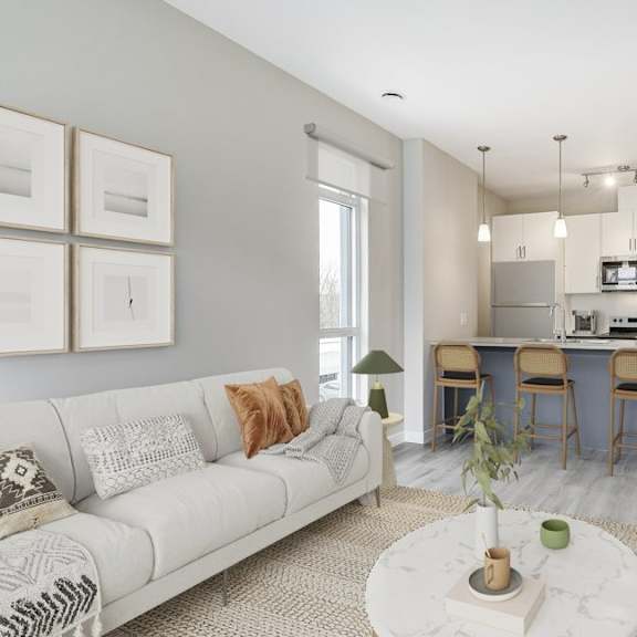 living room and kitchen with a couch and a table  at 101 base line road west, london, ontario