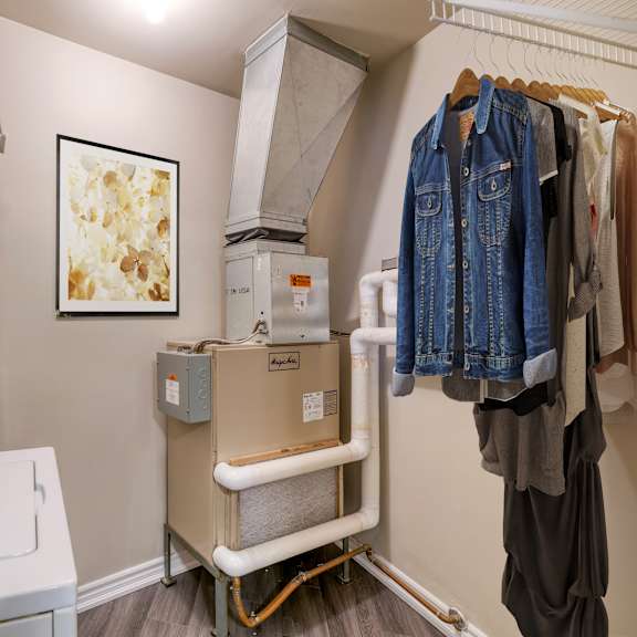 a laundry room with a washer and dryer