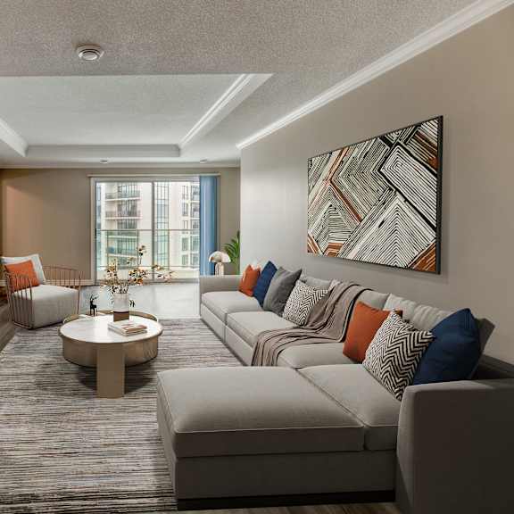 a living room with a couch coffee table and two chairs
