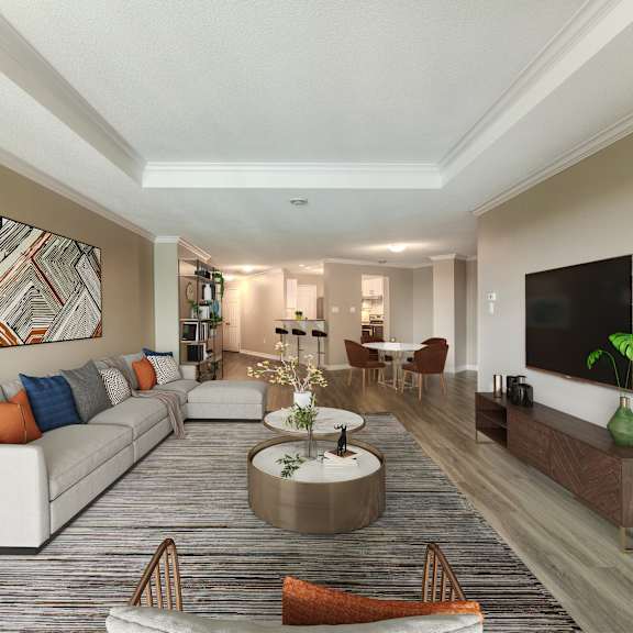 a living room filled with furniture and a flat screen tv