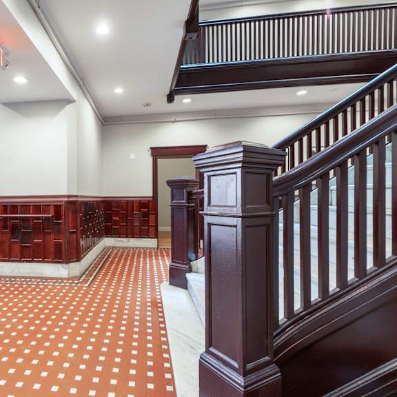 a red and white checkered floor in a building.