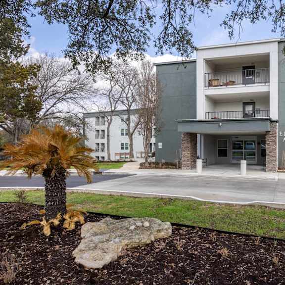 a modern apartment building named golden heights apartments.