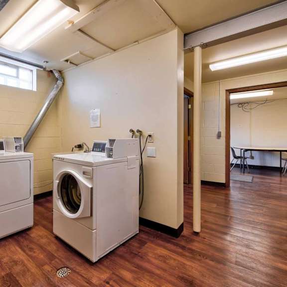 a laundry room with a washer and dryer.