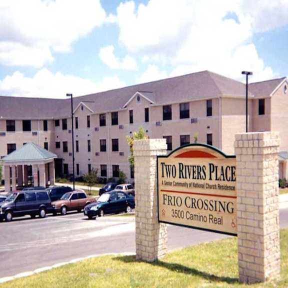 a building with a sign that says two rivers place.