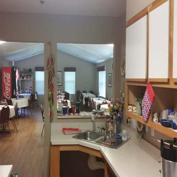 a kitchen with a sink and a counter.