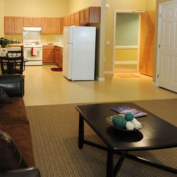 a living room with a couch and a coffee table.