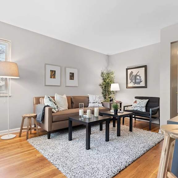 a living room with a couch and a table