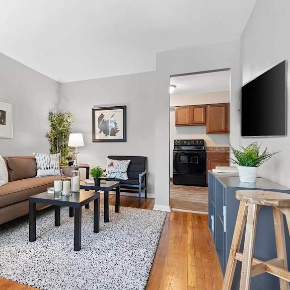a living room with a couch and a tv