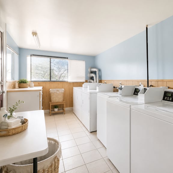 a laundry room with a washer and dryer.