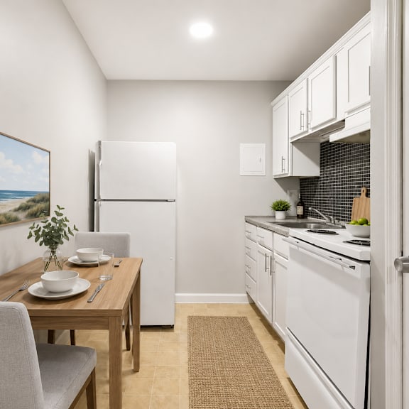 a kitchen with a table and chairs in front of a painting of a beach scene.