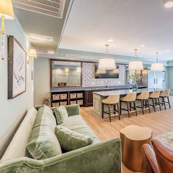 social lounge with a community kitchen and seating area