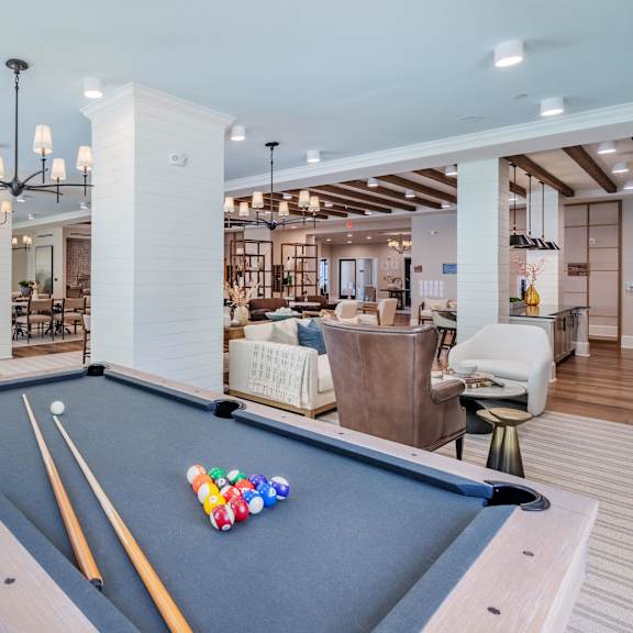 pool table in the arden at huntersville 55+ community game room