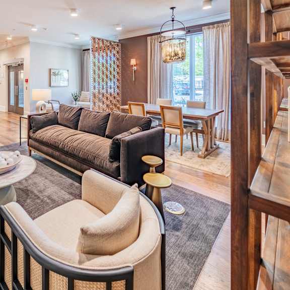 seating area in the resident social lounge at arden at huntersville