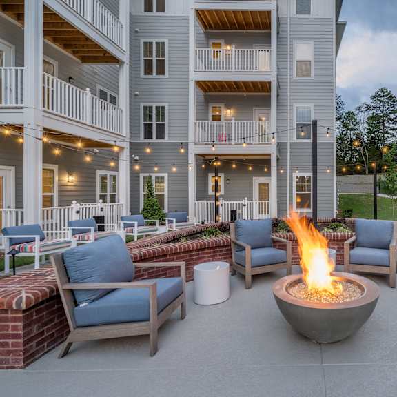 arden at huntersville's outdoor lounge with a fire pit