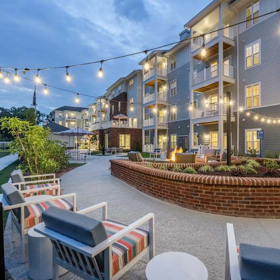 patio seating under string lights