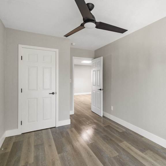 bedroom with ceiling fan at ocean breeze terrace apartment, huntington beach, ca, 92648