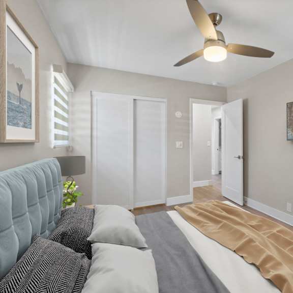 bedroom with ceiling fan at ocean edge @ laguna beach, california