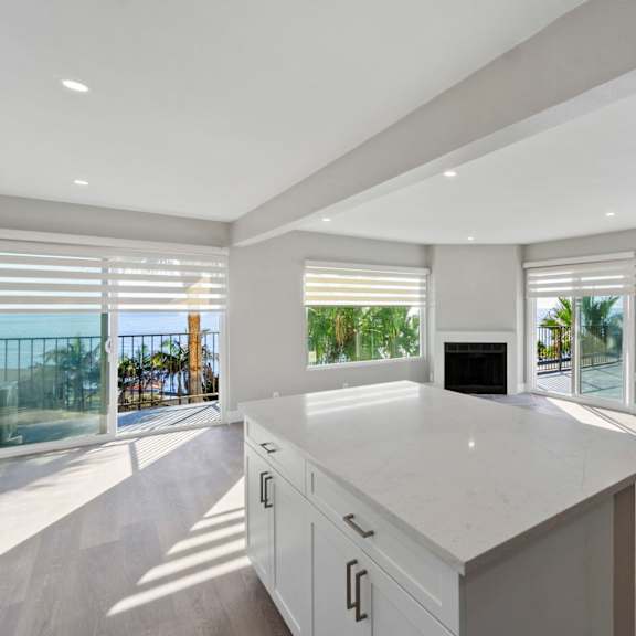 kitchen and living area at ocean edge @ laguna beach, laguna beach, ca