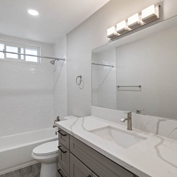 bathroom with bathtub at 316 beach apartments, huntington beach, california