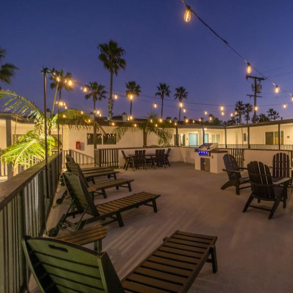 deck with bbq at ocean breeze terrace apartment, huntington beach, california